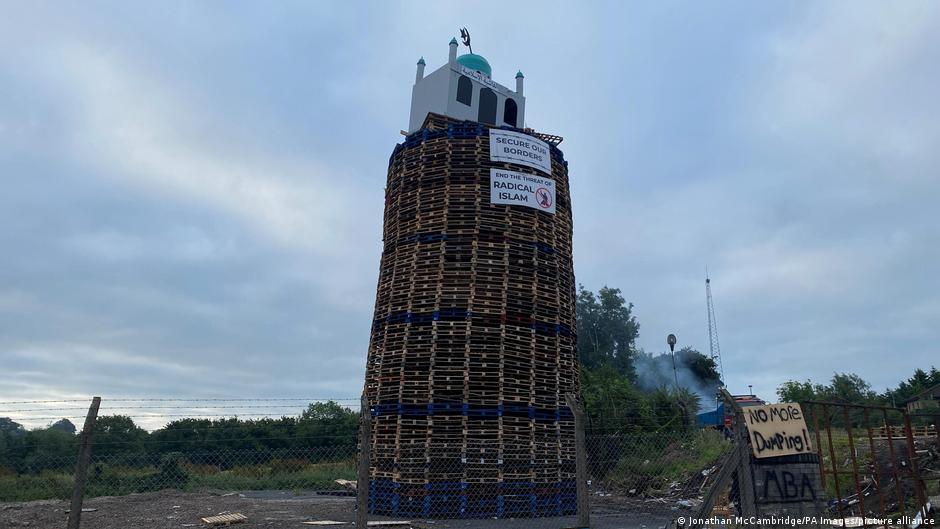 Northern Ireland Bonfire Sparks Controversy Over Religious Symbol